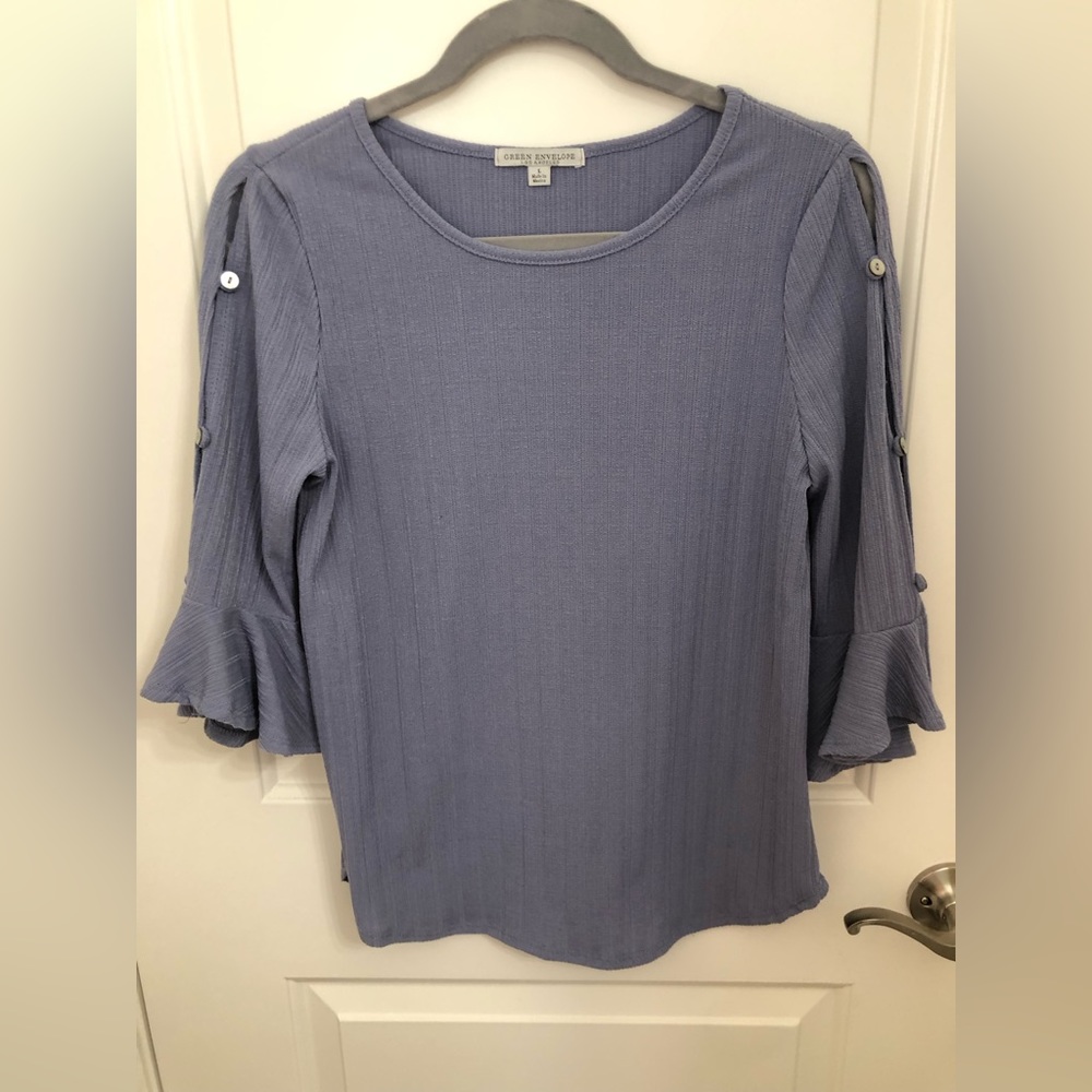 Periwinkle blouse with button and ruffle sleeves